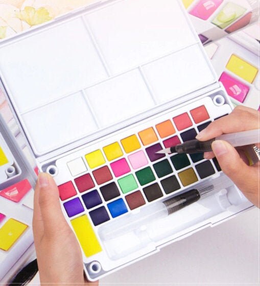 ชุดสีน้ำพร้อมพู่กันสีน้ำ - ปากกาสีเม็ดสีแน่น อุปกรณ์วาดภาพ อุปกรณ์ศิลปะ ศิลปินมืออาชีพ สีพกพา 12 18 24 36 สี
